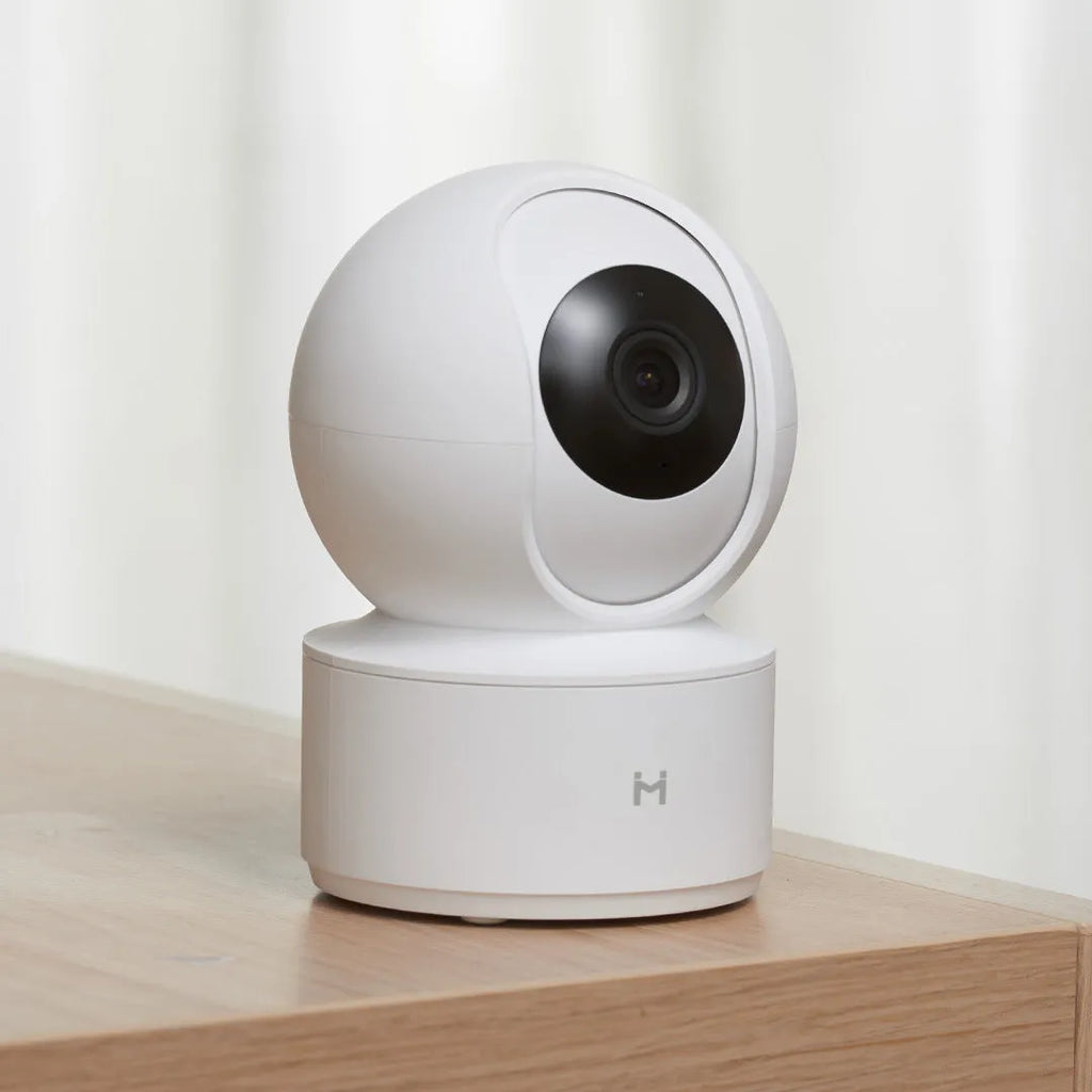 White Xiaobai Smart Camera showing front lens and compact rectangular housing