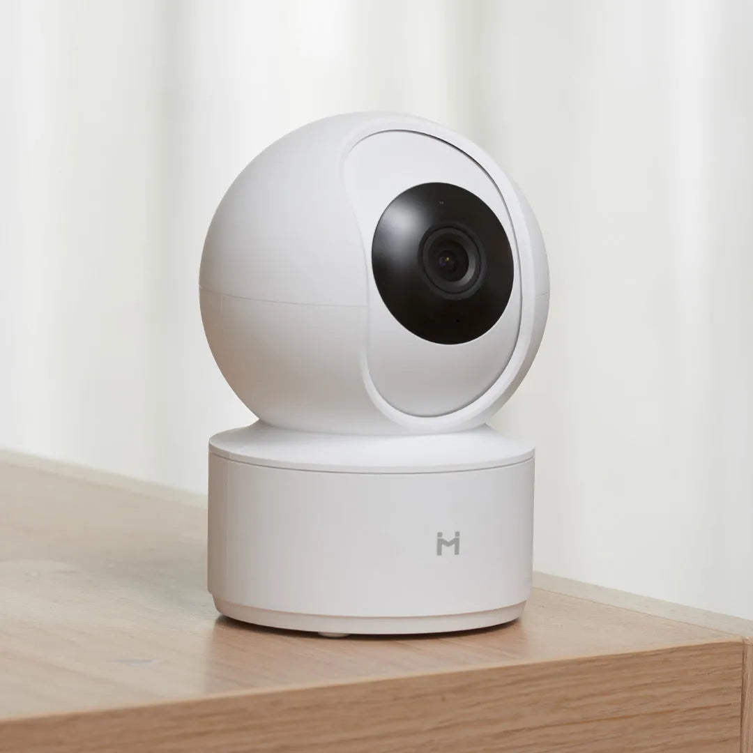 White Xiaobai Smart Camera showing front lens and compact rectangular housing