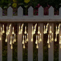 Outdoor solar LED string lights with water drop pendants on a 6.5 metre cable.