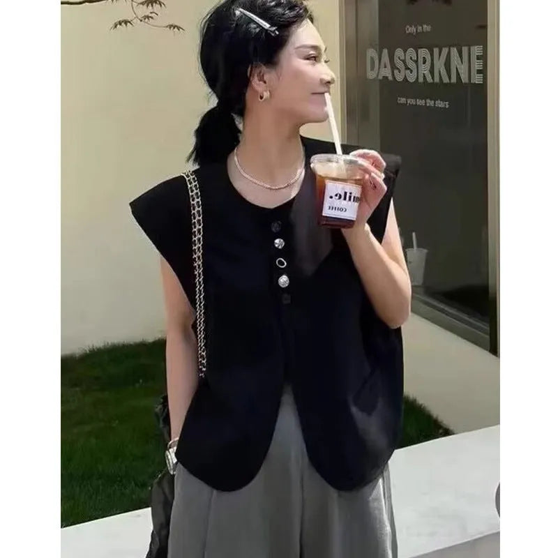 Women's short length polyester vest in milky white with front pockets