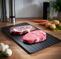 Black aluminum defrosting tray for thawing frozen meat without electricity