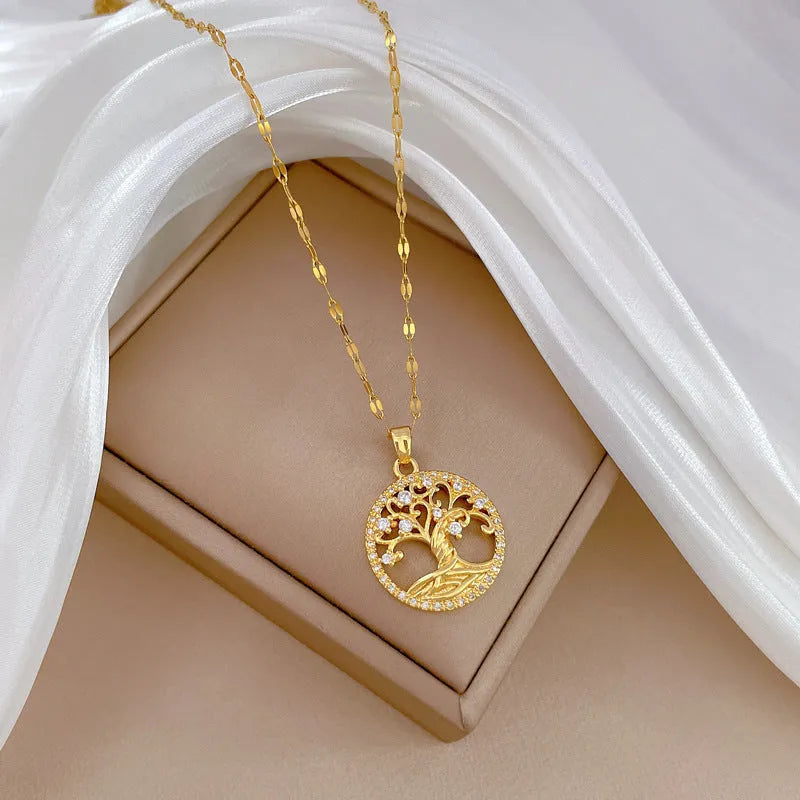 Gold-plated rhinestone and zircon cross necklace with a white mother-of-pearl pendant on a stainless steel chain.