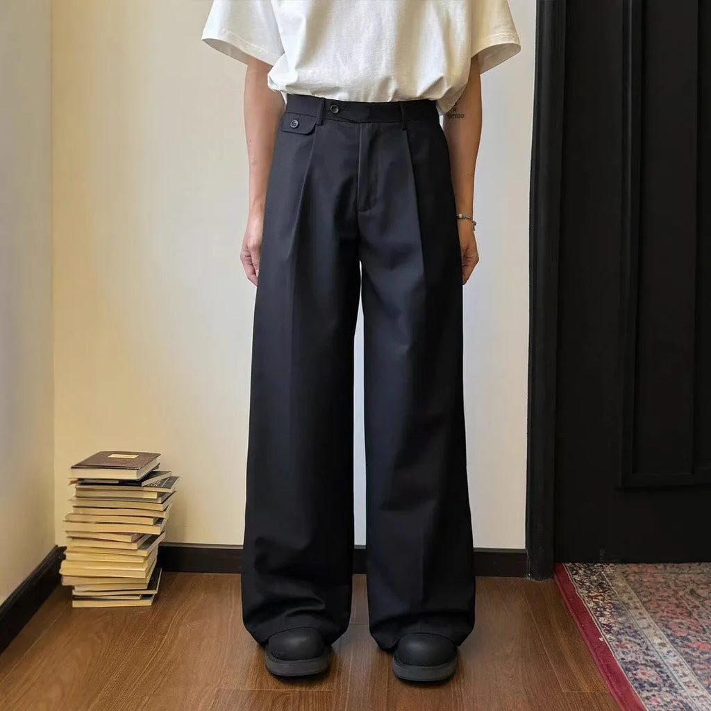 Brown men's wide-leg straight trousers with a draping casual suit style on a hanger.