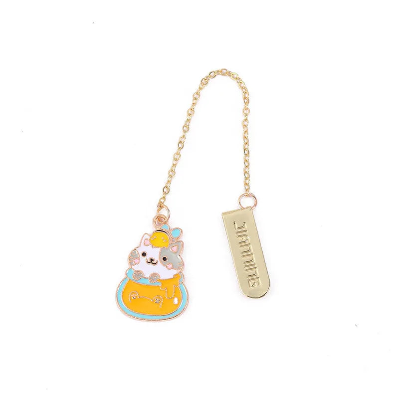 Jane Key Foodie Cat metal bookmark with cartoon cat design on laminated card.