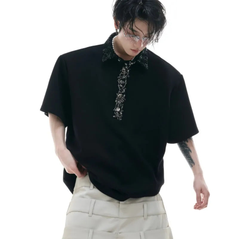 Men's loose black polo t-shirt with square collar, short sleeves, and embroidery sequin pattern.