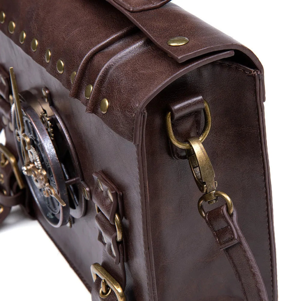Bronze steampunk shoulder bag with textured PU, metal hardware, and square pillow shape.