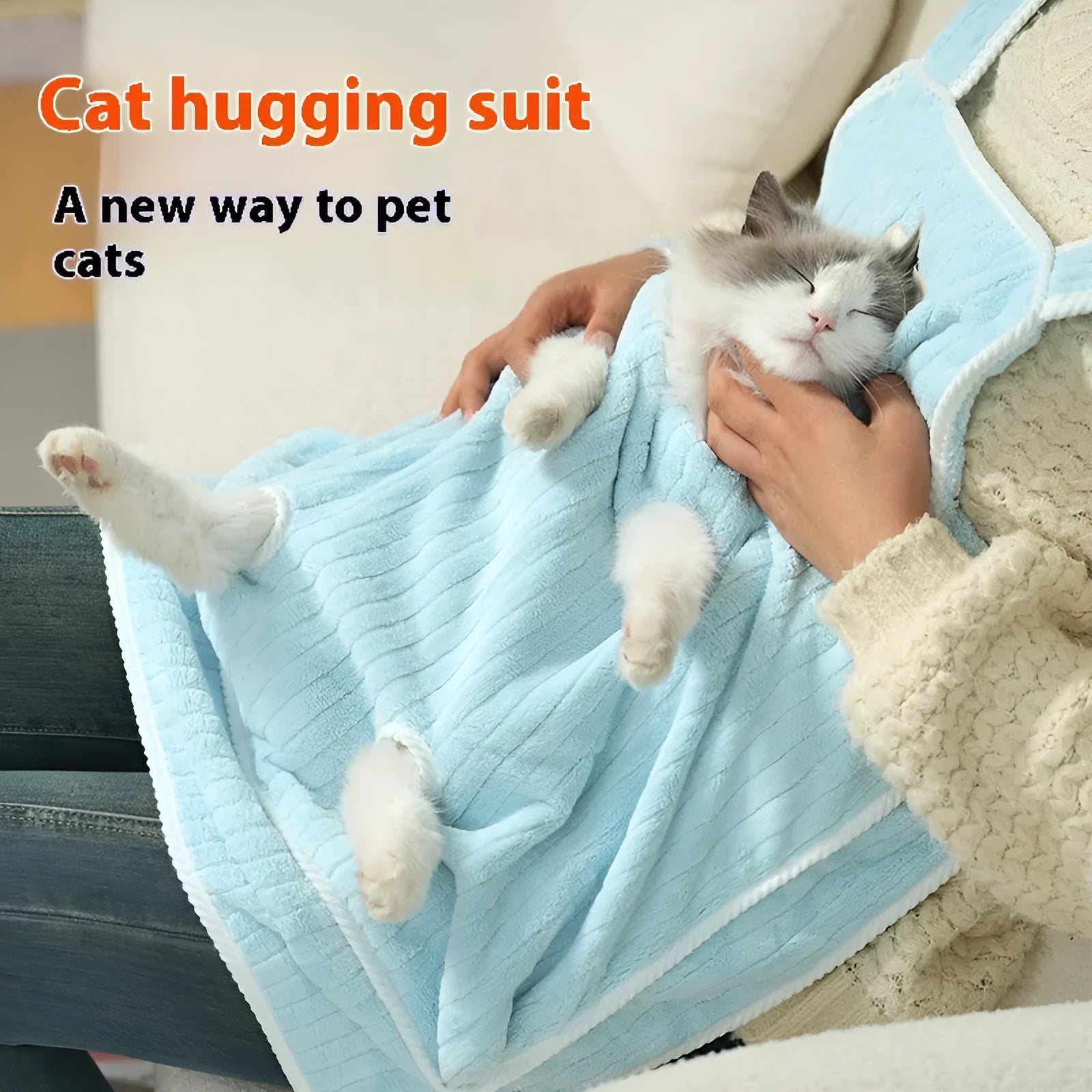 Cloth cat grooming apron in light blue with ventilation holes for breathability during petting
