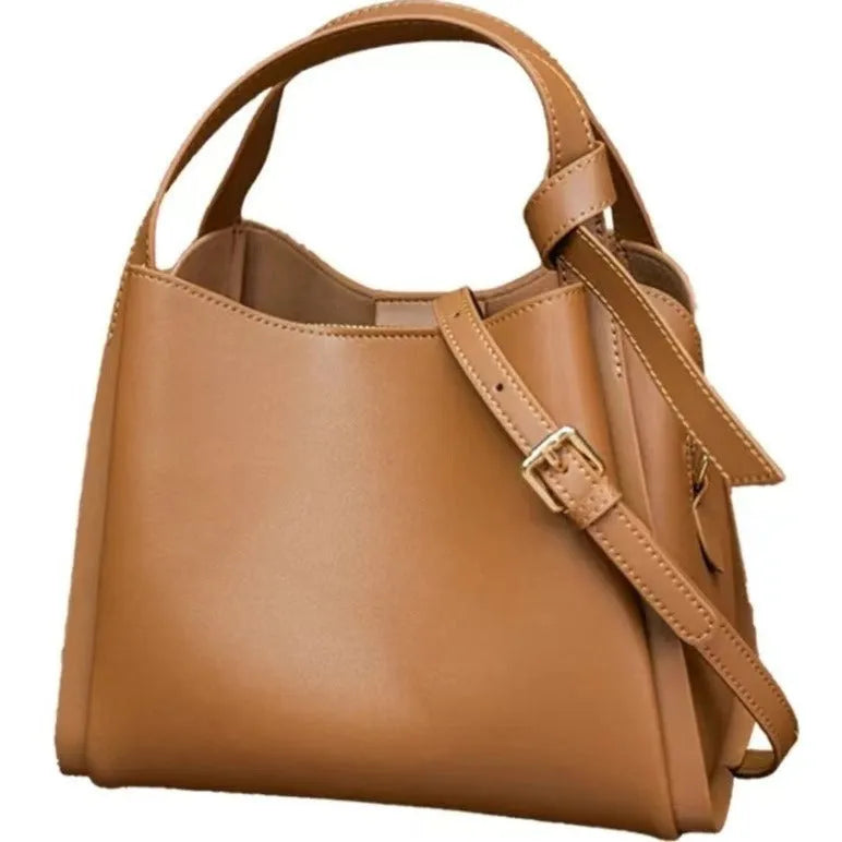 Women's soft cowhide crossbody bucket bag in tea brown colour with shoulder strap