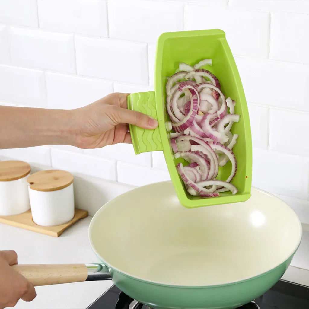 Green kitchen drain cutting board with drainage holes and storage trough mounted on a sink