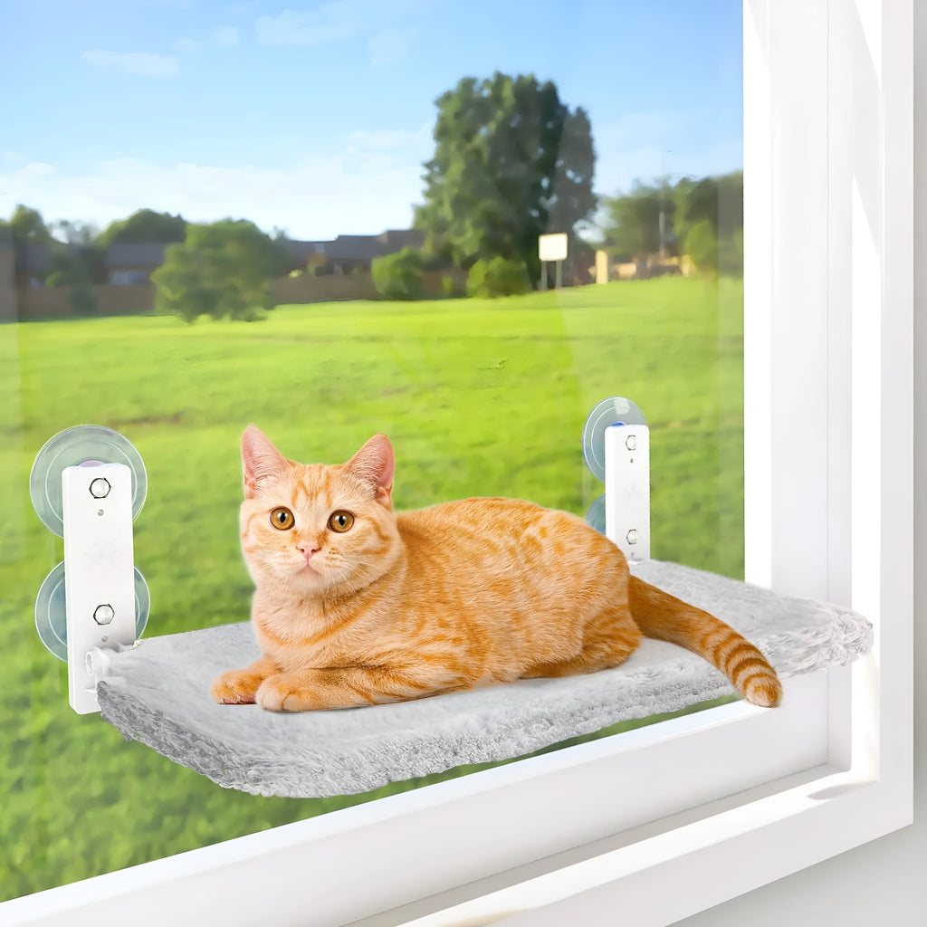 Cordless cat hammock window perch with gray plush fabric, folded on a windowsill