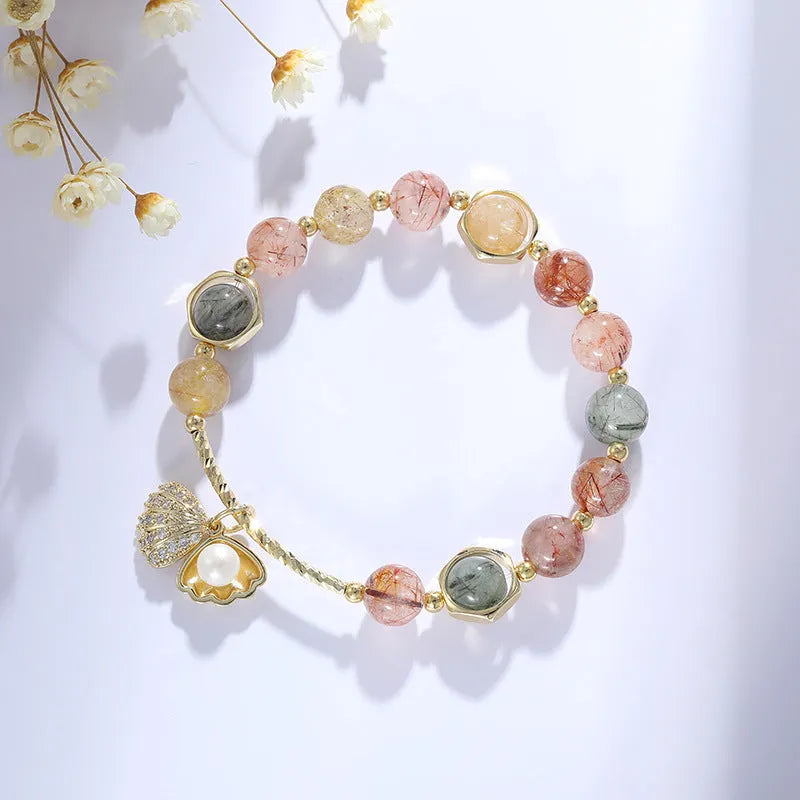 Women's crystal bracelet with shell design and animal zodiac modelling