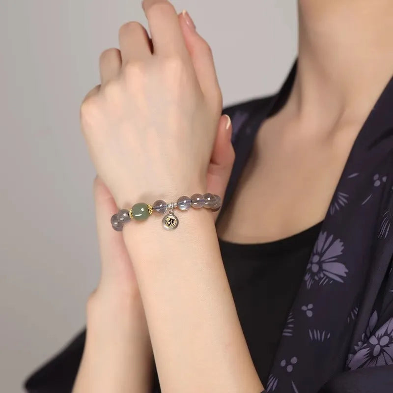 Moonstone Buddhist prayer beads bracelet with electroplated finish and Kwan-yin mouse design