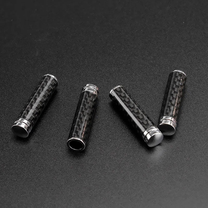 Set of four carbon fibre and metal car door lift decorative covers for direct replacement installation.