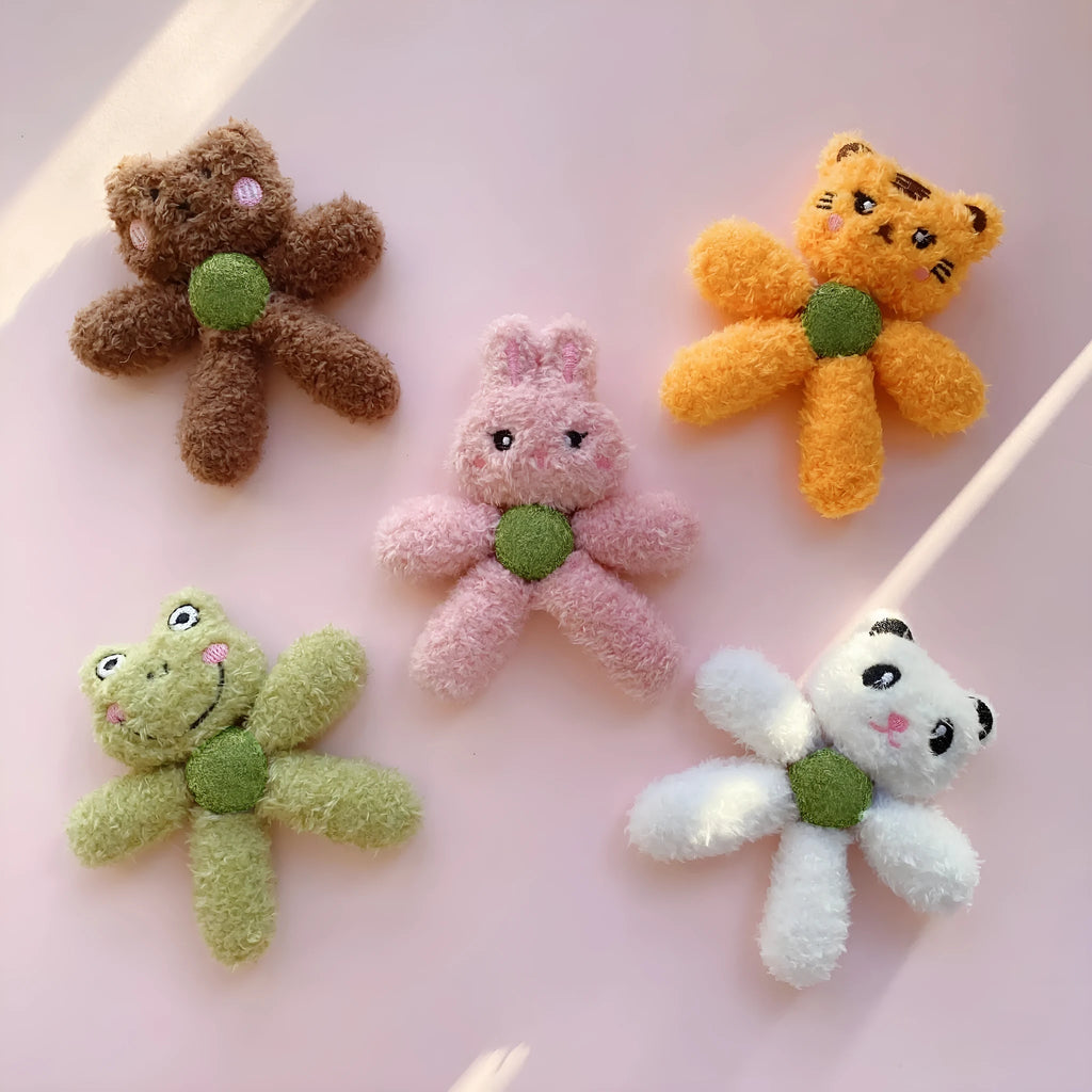 Interactive catnip ball toy with edible catnip stuffing for kitten dental care in character designs