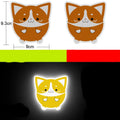 A pair of diamond-grade reflective warning stickers, measuring 9cm by 5cm, showing sample graphic designs.