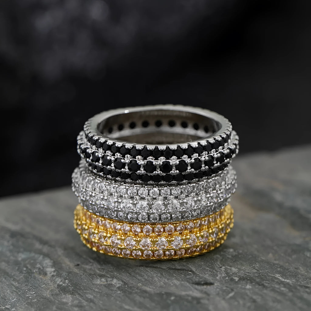 Geometric triangular personalised engagement ring with zircon stones in gold and platinum colour finishes.