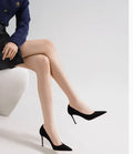 Women's black pointed toe slip-on high heels with a French mouth design on a white background.