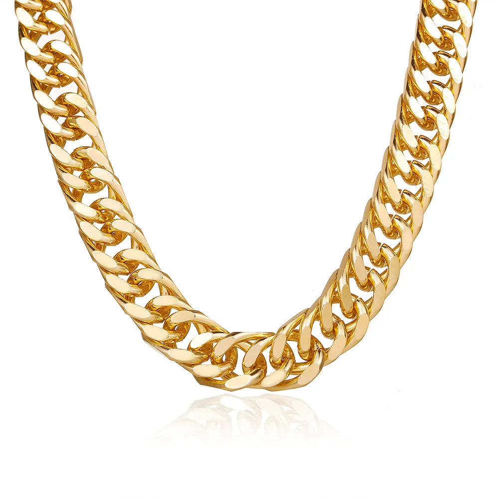 Gold tone thick chain women's necklace on a white background, showing the clasp and extender.