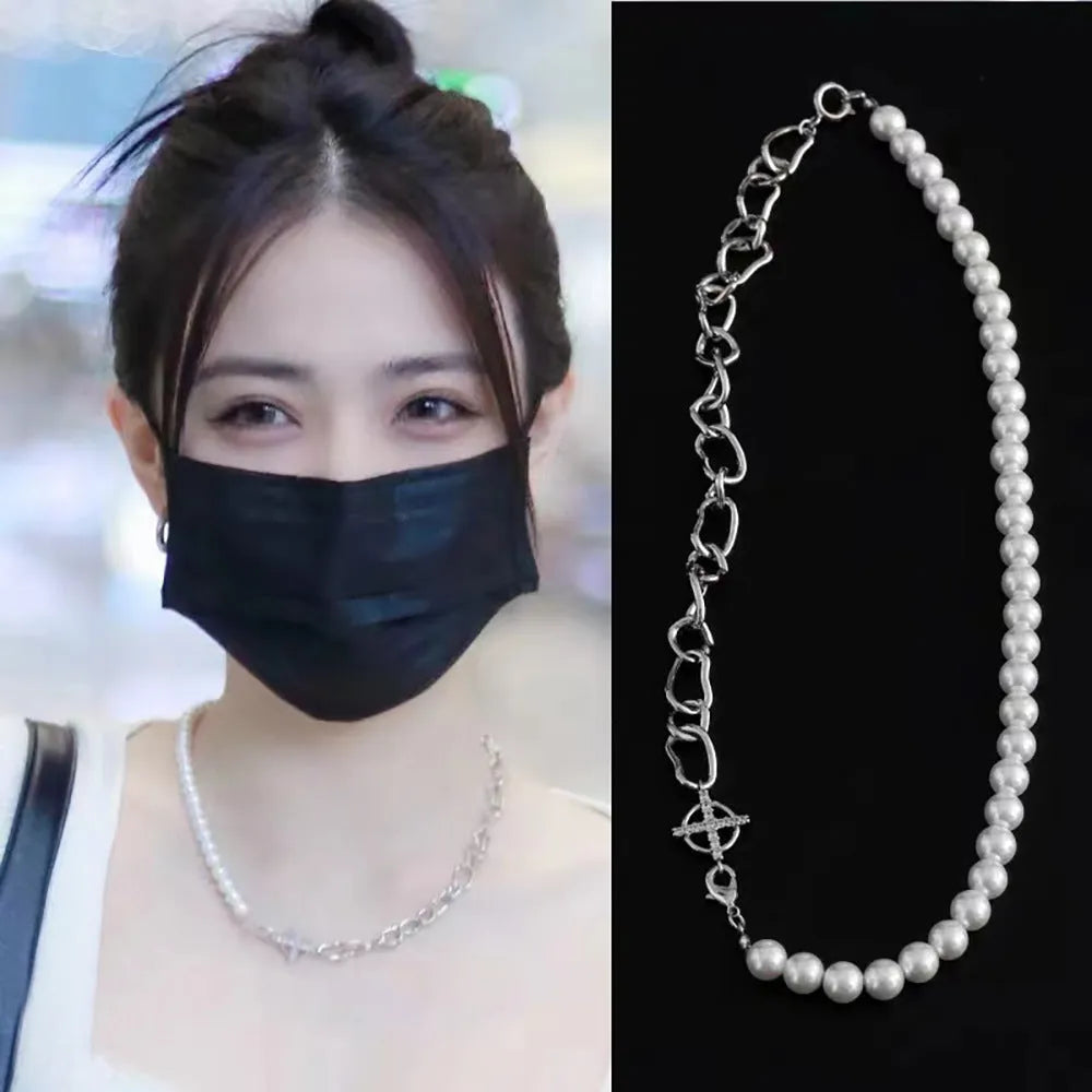 White geometric asymmetric acrylic fashion necklace with a twisted chain design.