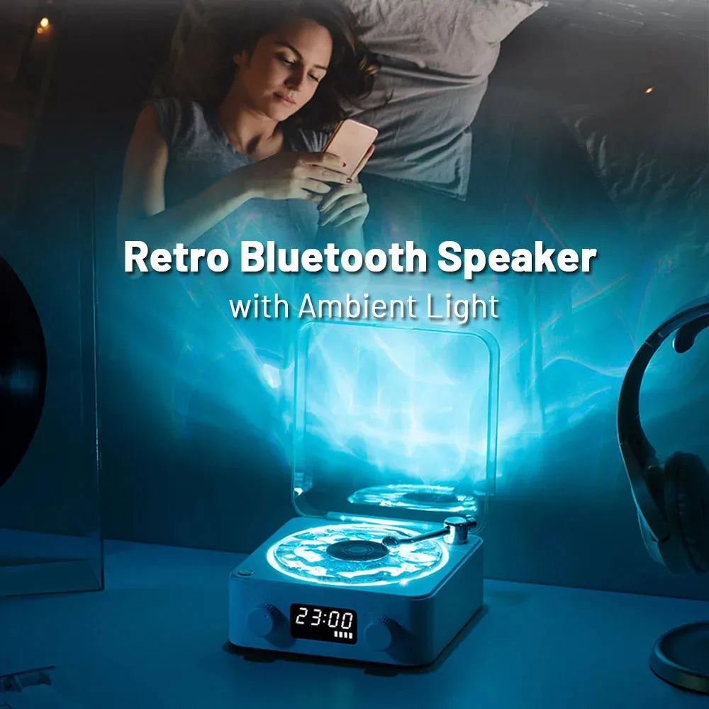 Blue retro-style Bluetooth speaker with rotating transparent turntable and RGB projection lighting