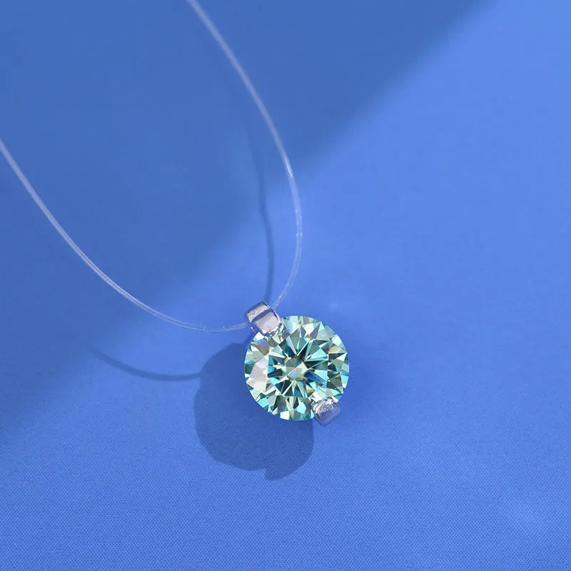 Close-up of a silver plum blossom pendant necklace with a moissanite stone set on an invisible fishing line.
