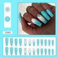 Solid colour artificial nails with long ballet shape and blue diamond glitter decoration