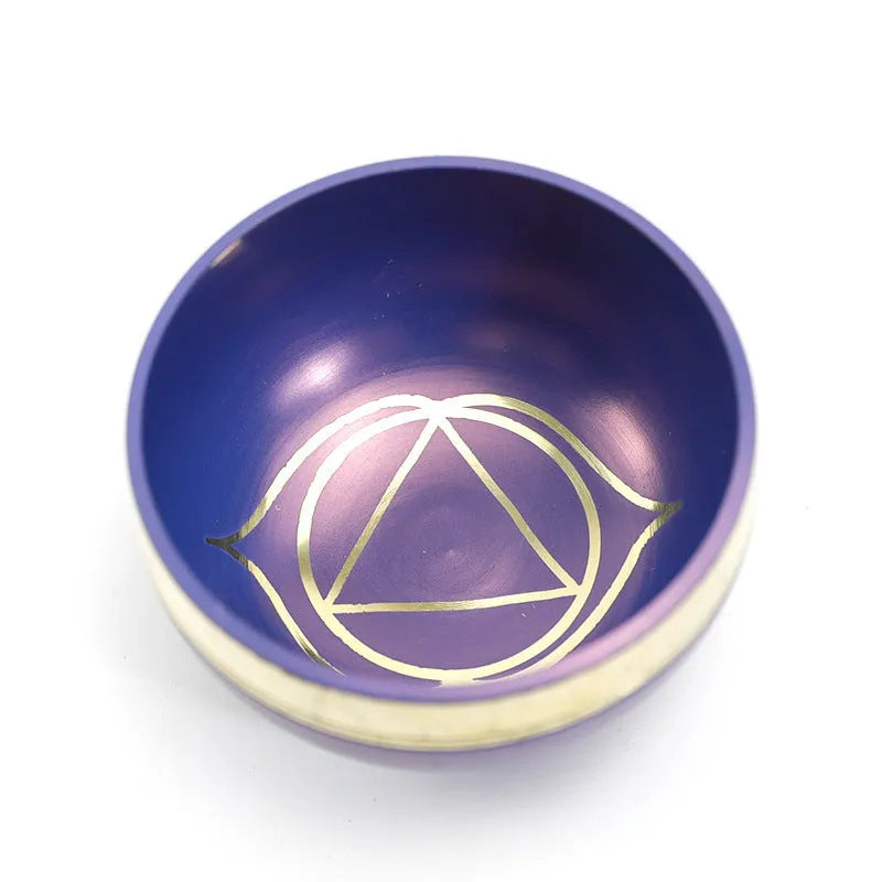 Handmade Himalayan singing bowl percussion instrument in multiple colours for meditation and yoga