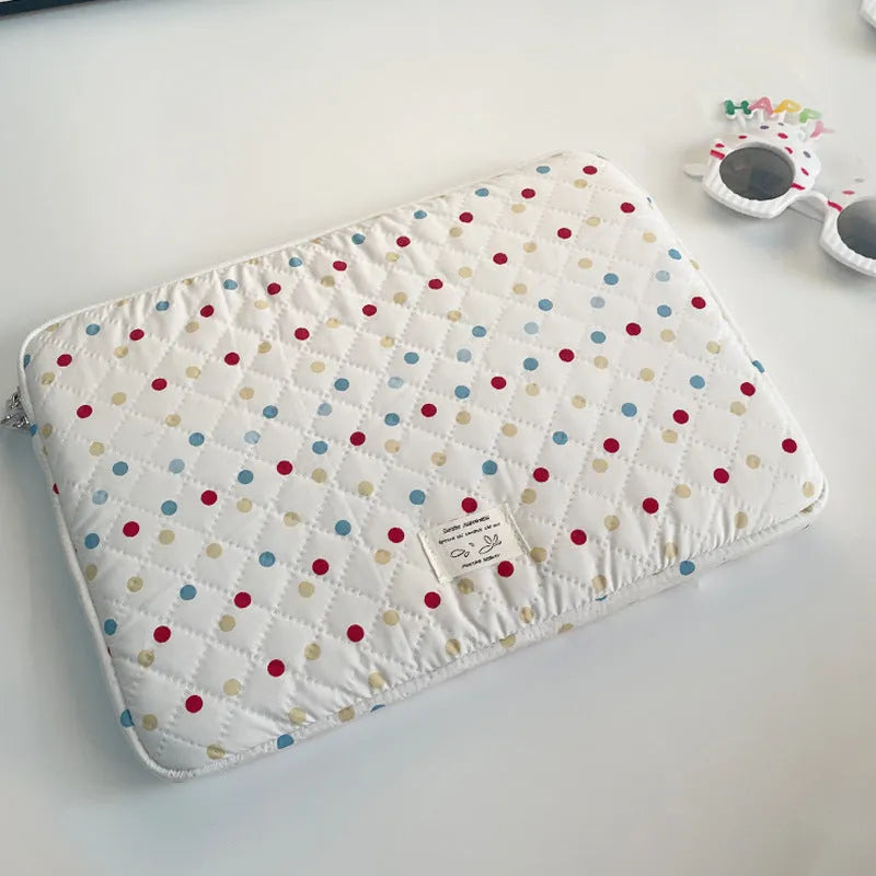 Women's polka dot laptop bag in breathable polyester with size options for computer protection