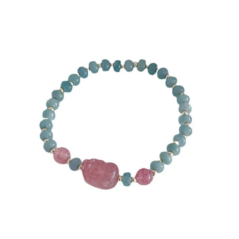 Natural blue water jade bracelet with gourd beads and peace buckle charm on woman's wrist