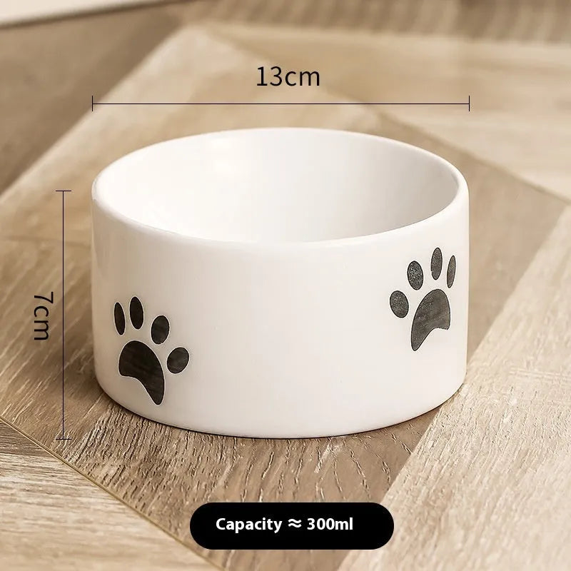 Ceramic cat paw design pet bowl with high-foot base in slanted mouth style