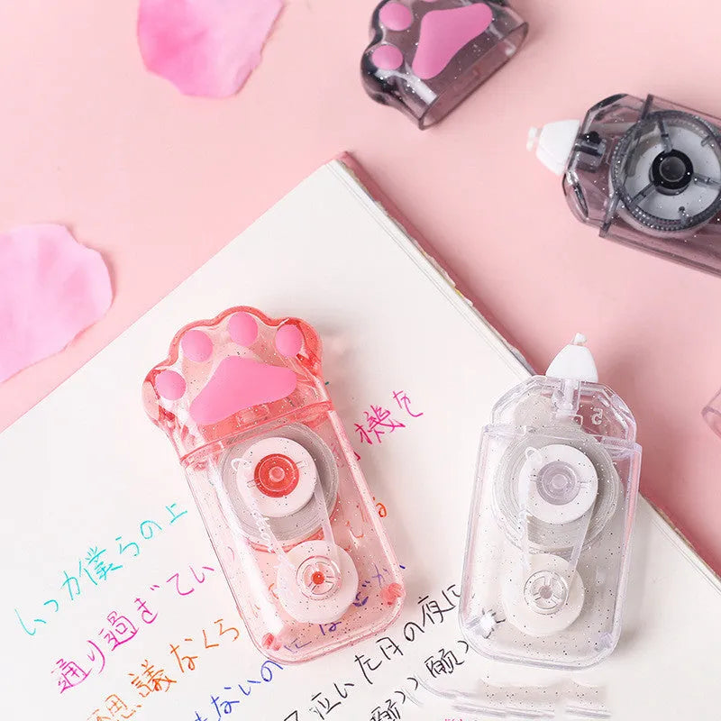 Cat claw correction tape dispenser with 5mm wide PET plastic tape in skyco cat claw bag packaging.