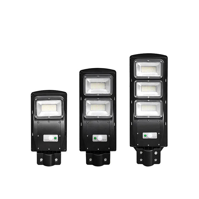 Integrated solar street light with solar panel on top and LED light unit below, for outdoor installation.