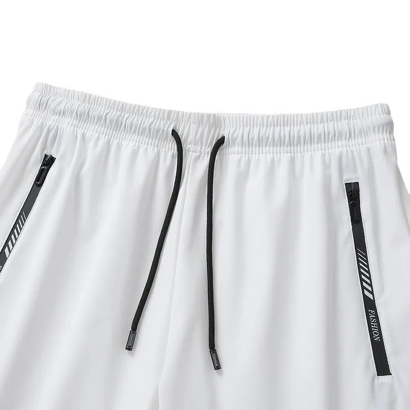 Men's black quick-drying nylon sports shorts with loose fit and medium elastic waistband
