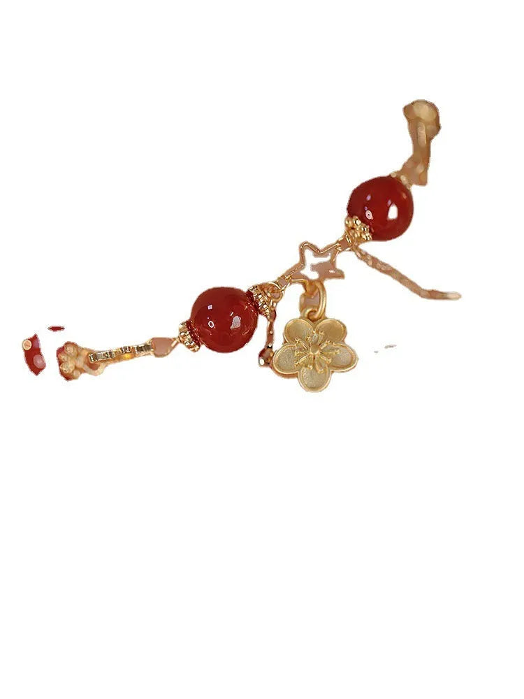 Red agate double layer women's bracelet with floral peach blossom charms on adjustable fastening