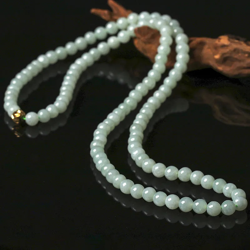 Natural jade bead necklace with round white and green beads on adjustable chain