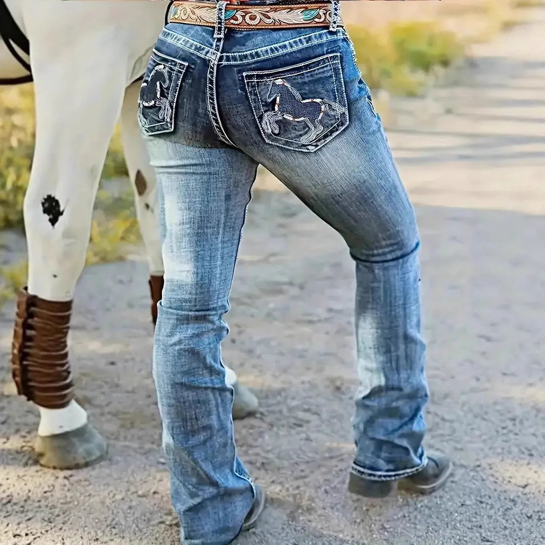 Hatchet Man women's high waist stretch denim straight-leg trousers in navy blue with embroidery and zipper fly.