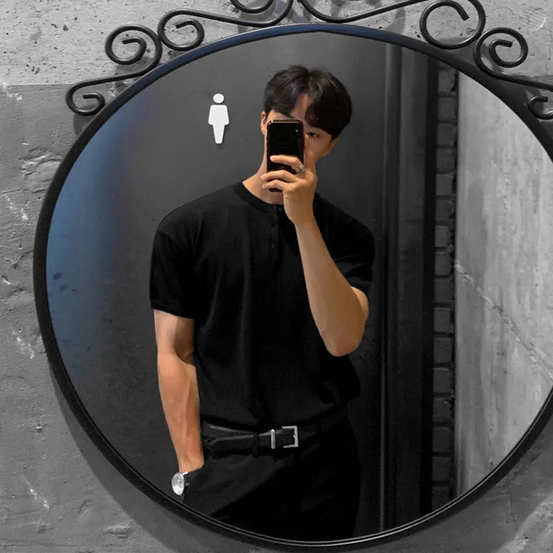 Men's black slim-fit short-sleeved ice silk knitted pullover shirt on a hanger.
