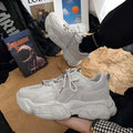 All-black men's platform running sneakers with PU upper and thick rubber sole, lace-up design