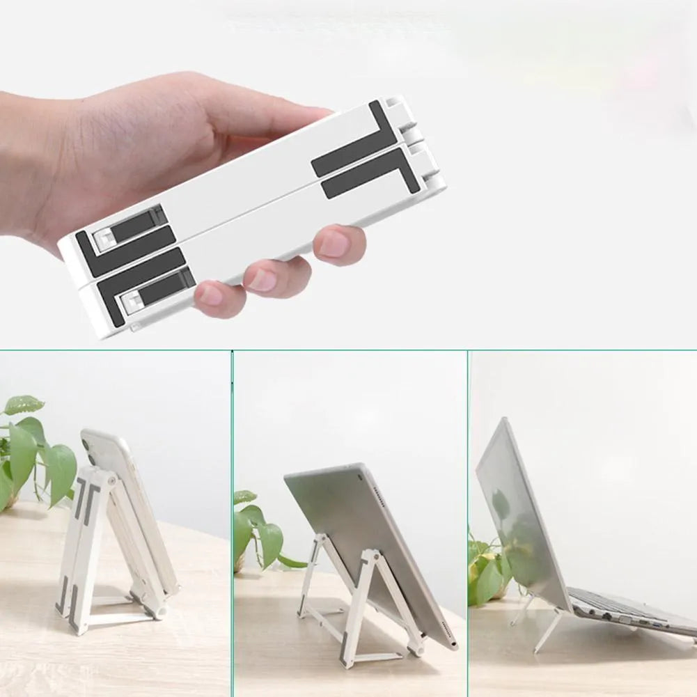 Grey multifunctional laptop stand with seven-shaped silicone grip on a flat surface