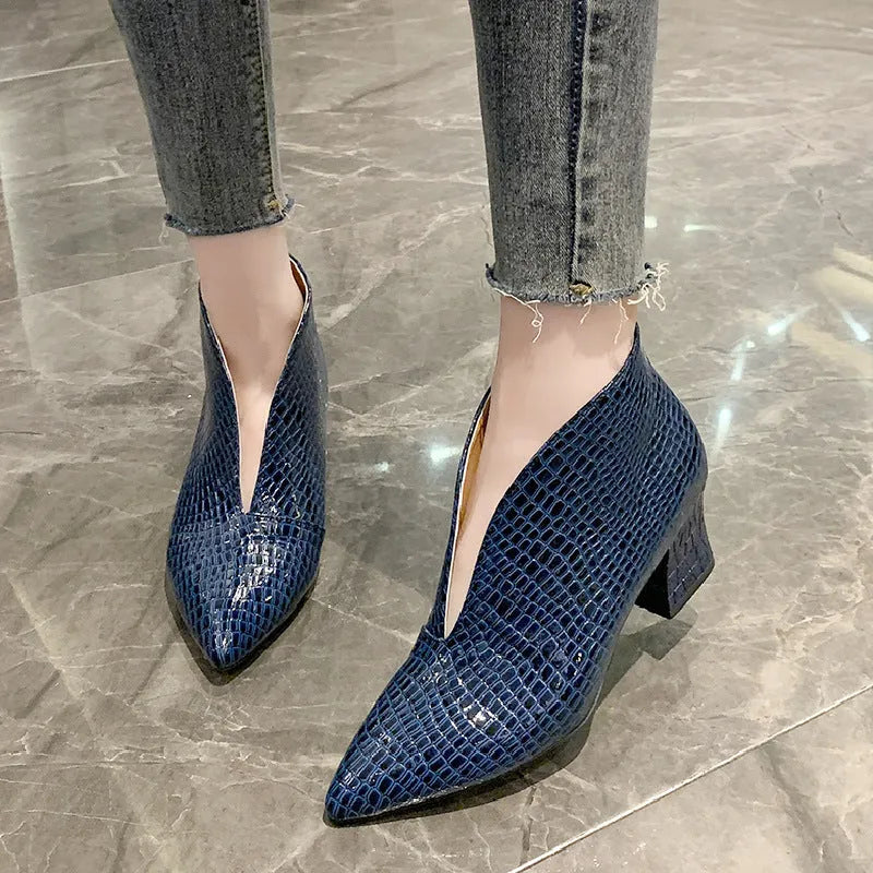 Black women's V-cut pointed ankle boots with an embossed PU upper and a chunky block heel.