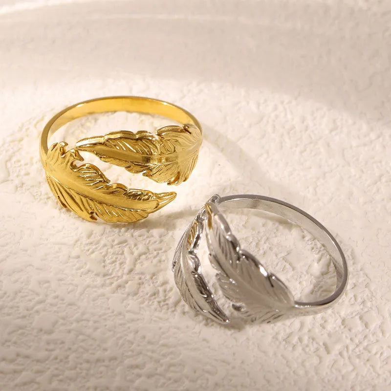 Women's adjustable stainless steel feather ring in gold and silver colour options