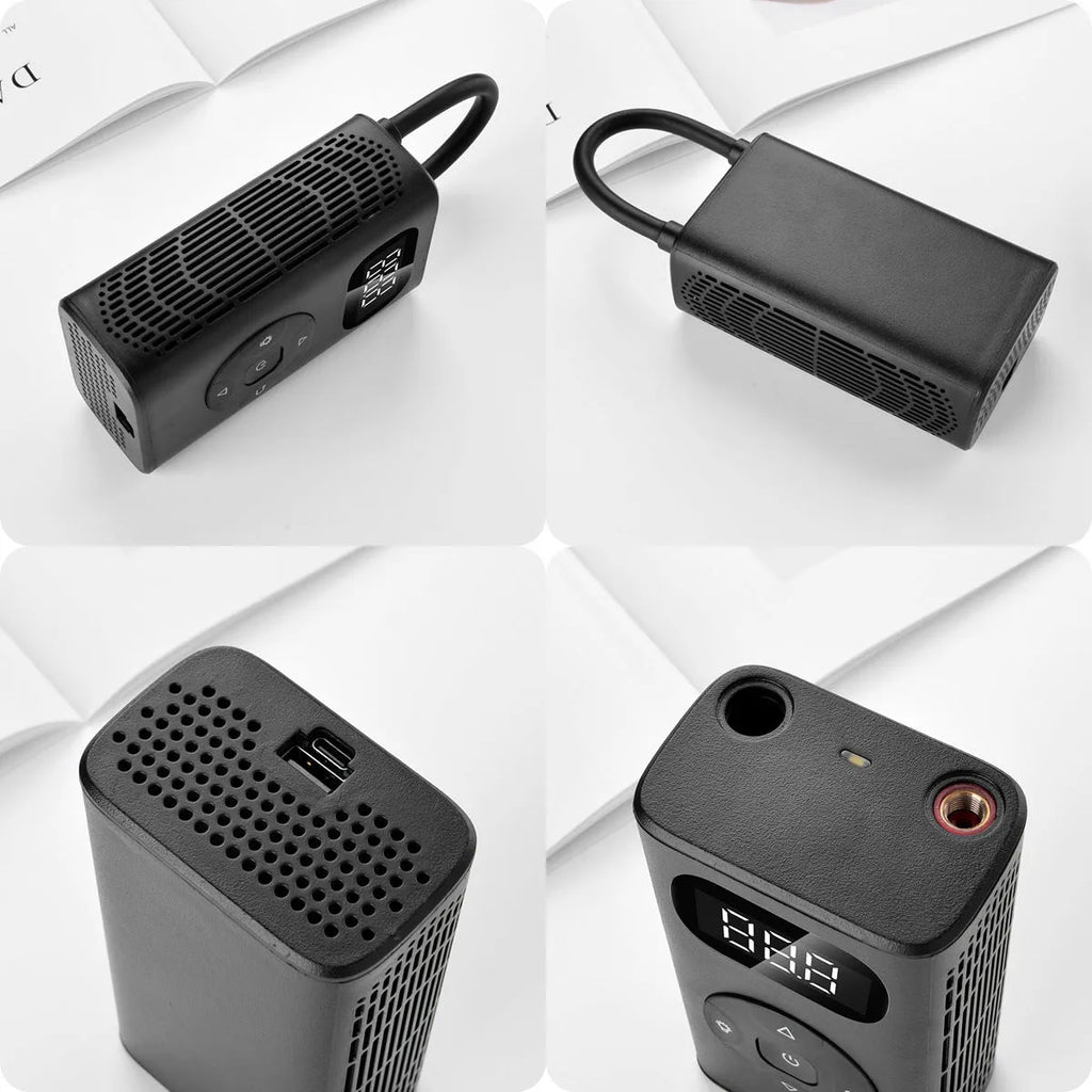 Black M09X portable tyre inflator power bank with USB cable and 16cm hose on grey background