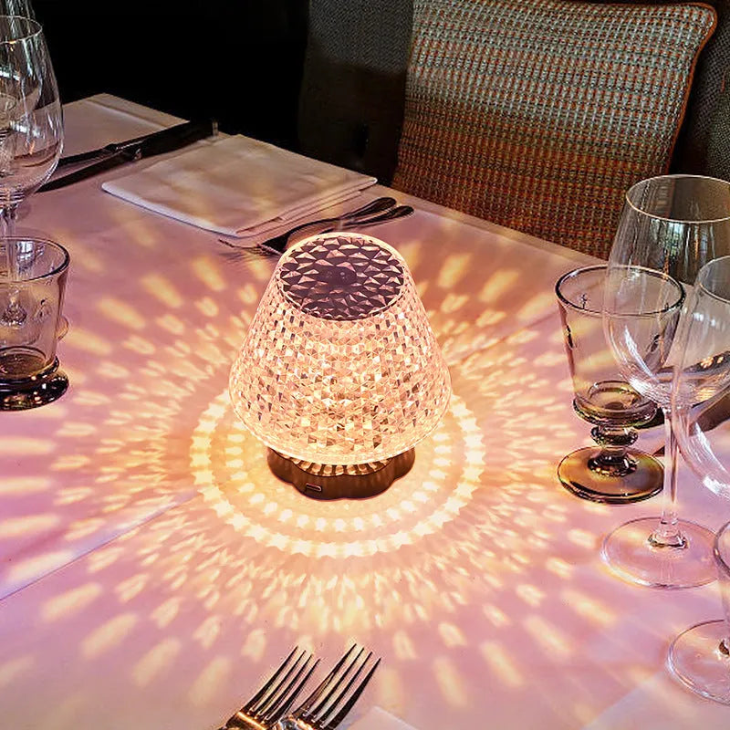 Crystal table lamp with touch base and LED lighting on wooden surface