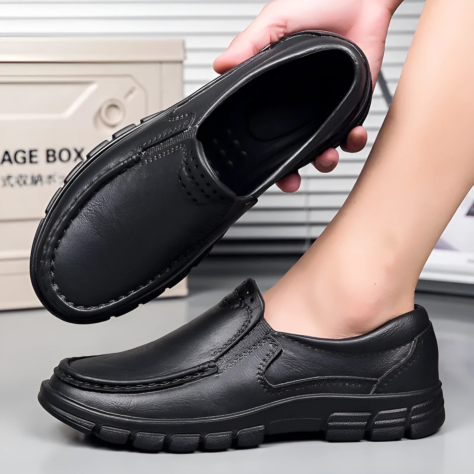 Men's black slip-on work shoes with artificial leather uppers and platform heel design