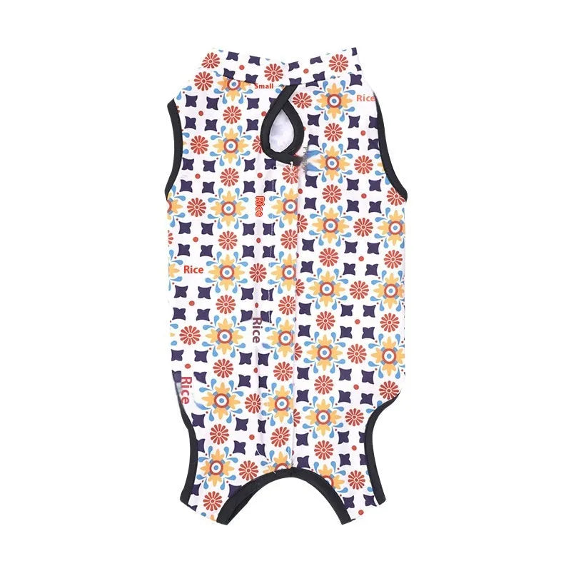 Colourful polyester cat recovery suit with velcro straps for post-sterilisation wound protection.