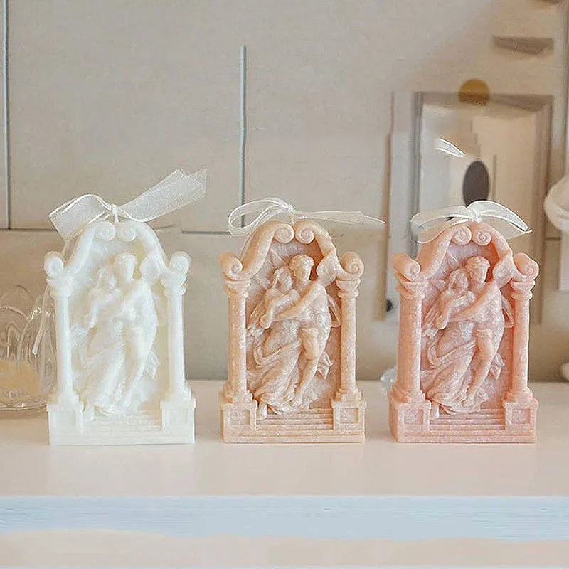 Food-grade silicone mould showing detailed Ancient Greek couple angel design for baking and crafts.