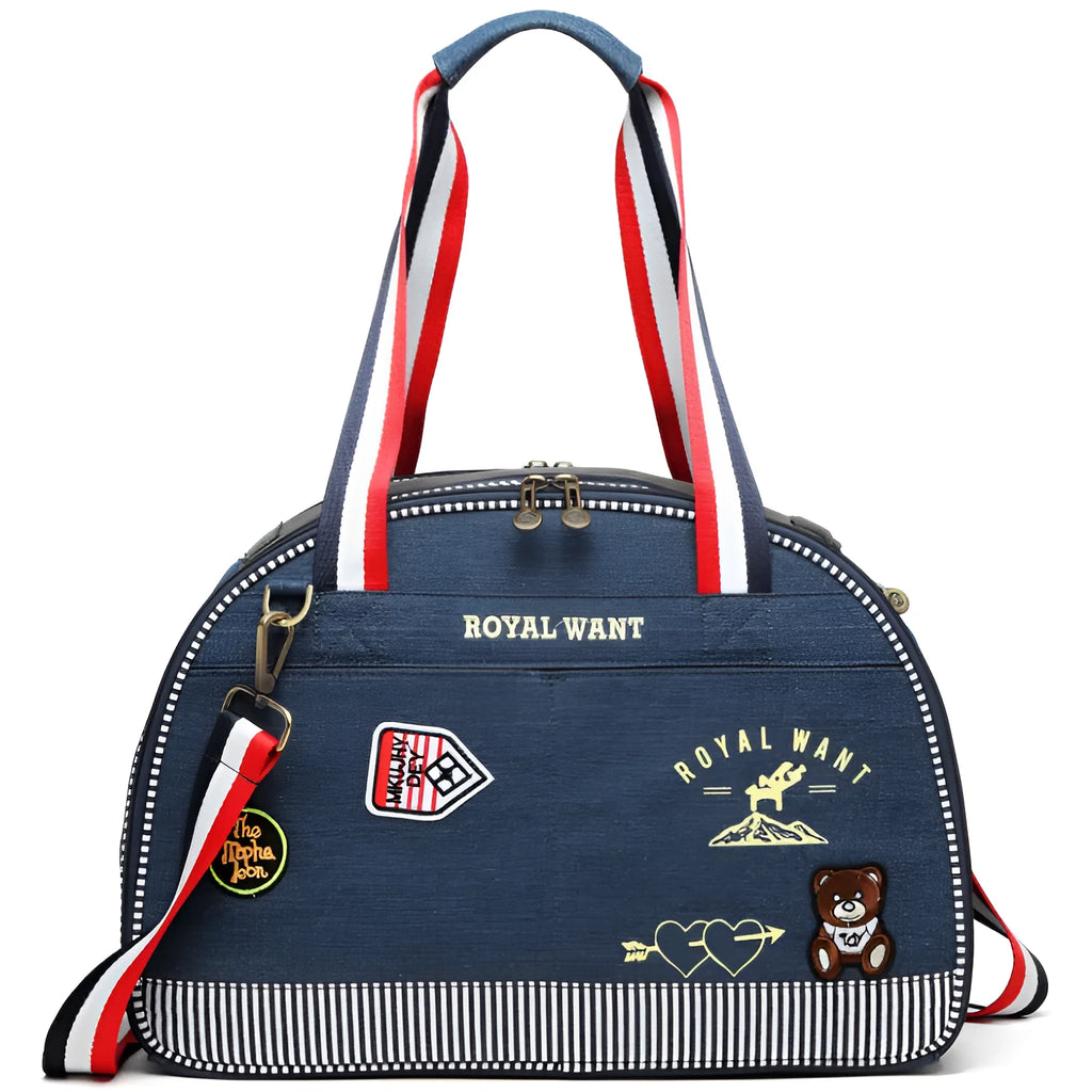 Blue denim pet carrier bag with cartoon pattern, measuring 43cm by 20cm by 30cm.