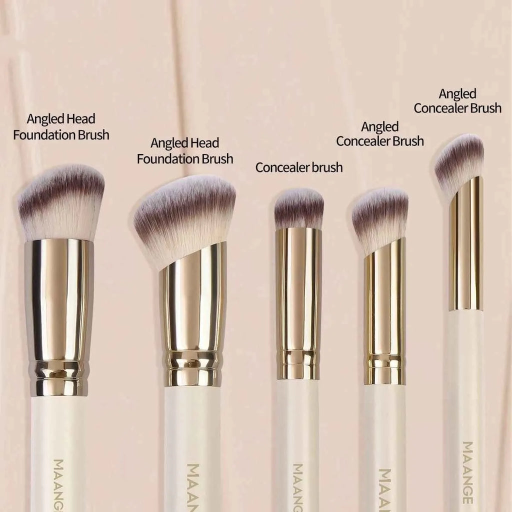 Five apricot coloured angled makeup brushes with synthetic bristles for foundation and powder application