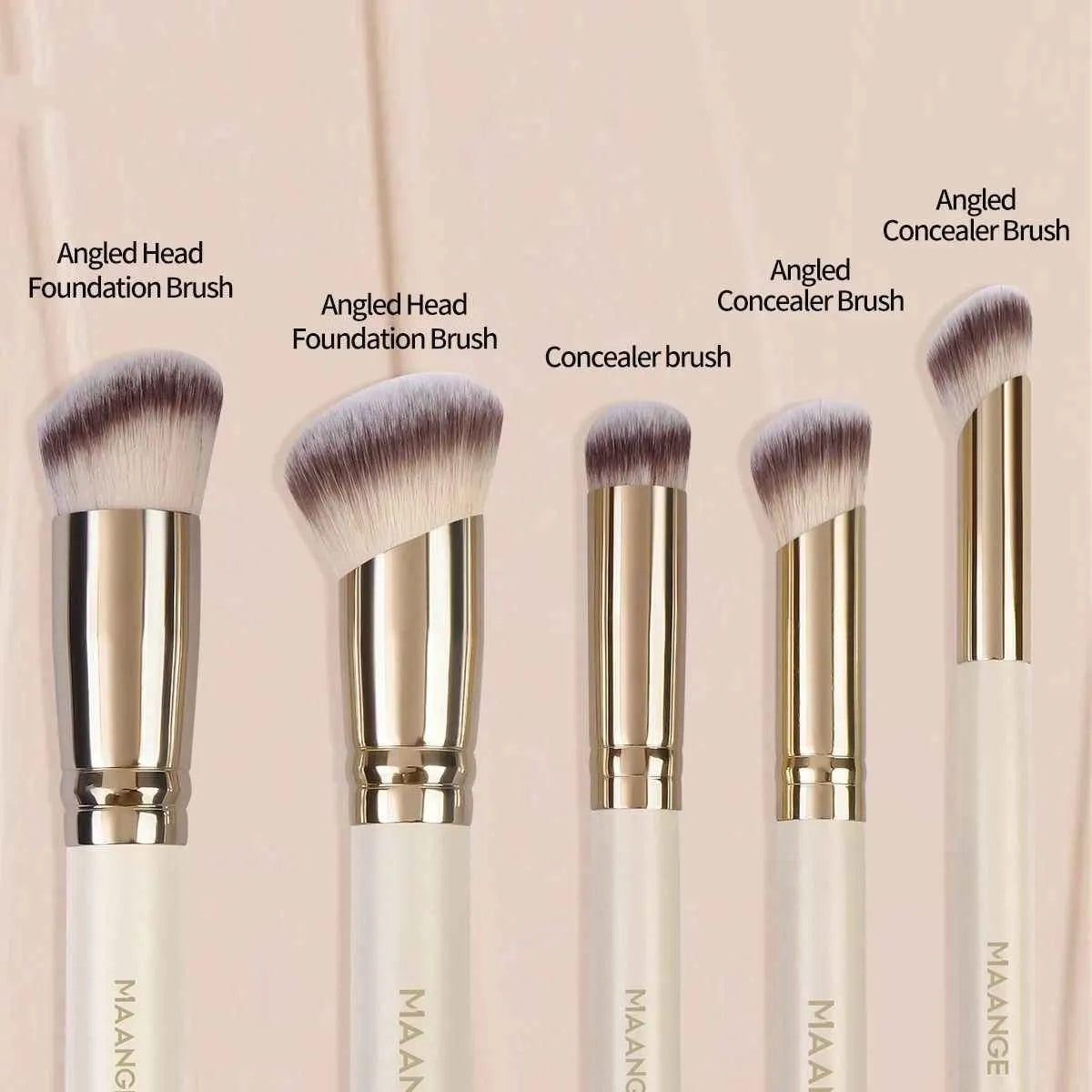 Five apricot coloured angled makeup brushes with synthetic bristles for foundation and powder application
