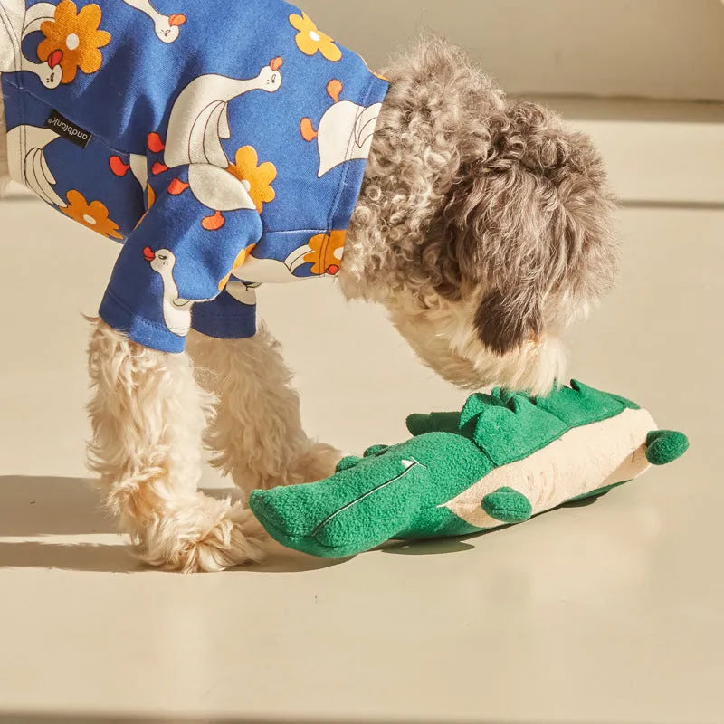 Green plush toy dog measuring 35cm tall by 18cm wide on white background